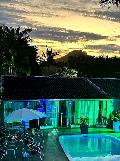 Seasonal outdoor pool, open 9:00 AM to noon, pool umbrellas