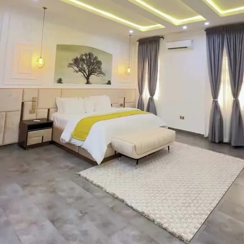 Deluxe Apartment, Balcony, City View | In-room safe, desk, laptop workspace, blackout drapes