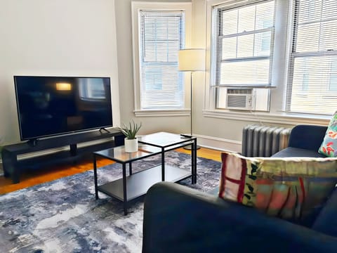 Comfort Apartment, 1 King Bed | Living area | 55-inch TV with digital channels, streaming services