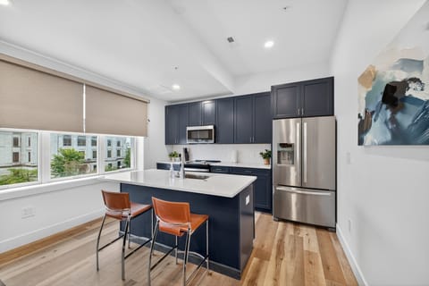 Apartment, 2 Bedrooms | Private kitchen | Fridge, oven, coffee/tea maker