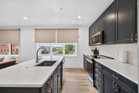 Apartment, 2 Bedrooms | Private kitchen | Fridge, oven, coffee/tea maker