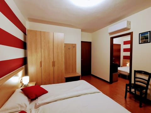 Family Room, Balcony, Mountain View | In-room safe, free WiFi, bed sheets