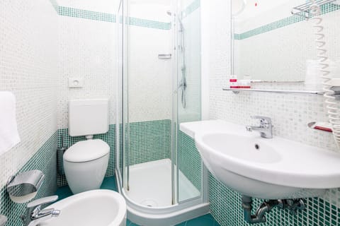 Shower, free toiletries, hair dryer, towels