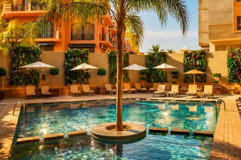 Outdoor pool, pool umbrellas, sun loungers