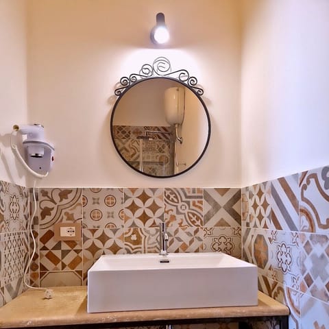 Double Room, City View | Bathroom | Shower, free toiletries, hair dryer, towels