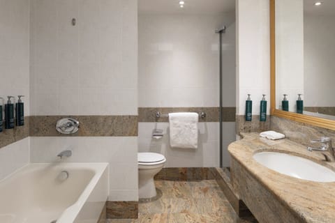 Separate tub and shower, deep soaking tub, free toiletries, hair dryer