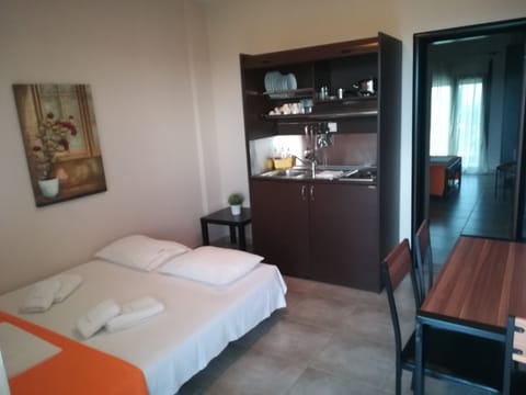 Family Suite, Balcony, Pool View | Private kitchen | Mini-fridge