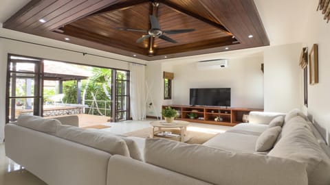 Villa, Patio, Pool View | Living area | 55-inch TV with cable channels