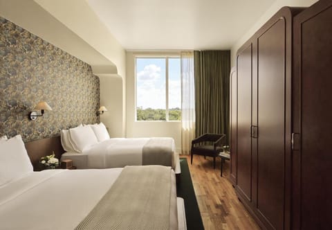 Premium bedding, down comforters, memory foam beds, minibar