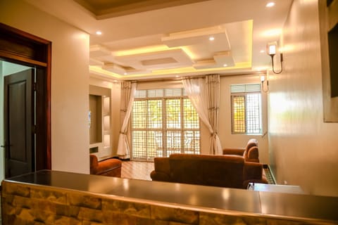 Comfort Apartment, Garden View | Living area | Flat-screen TV