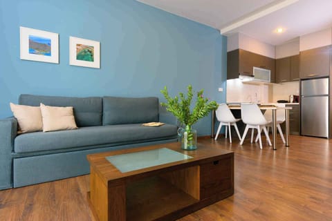 Comfort Apartment, 2 Bedrooms, Balcony, Partial Sea View | Living area | 32-inch Smart TV with satellite channels