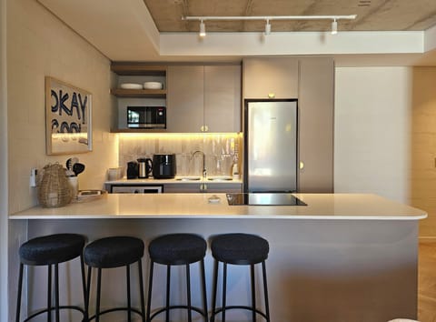 Two Bedroom | Private kitchen | Fridge, microwave, oven, coffee/tea maker