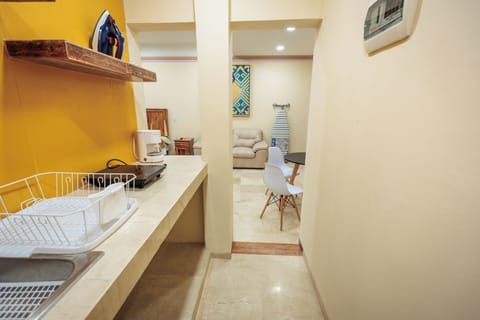 Fridge, microwave, stovetop, cookware/dishes/utensils