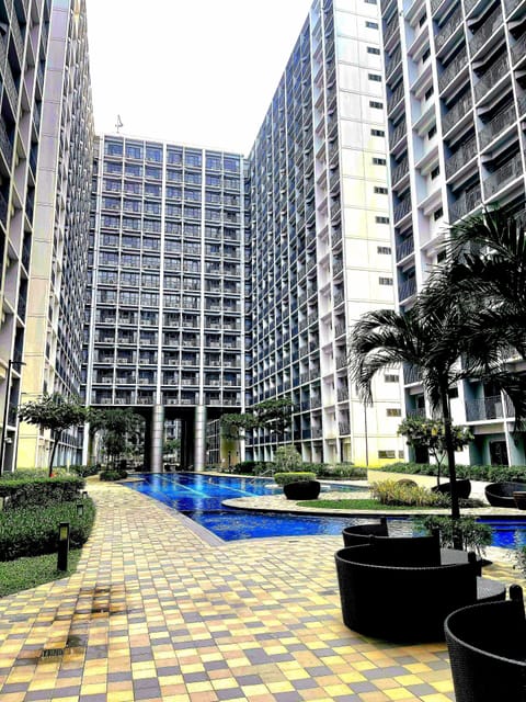2 outdoor pools, open 6:00 AM to 10:00 PM, pool umbrellas, sun loungers