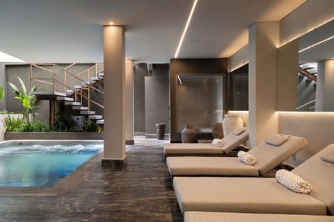Indoor pool, sun loungers