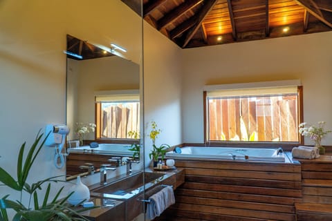 Separate tub and shower, deep soaking tub, designer toiletries