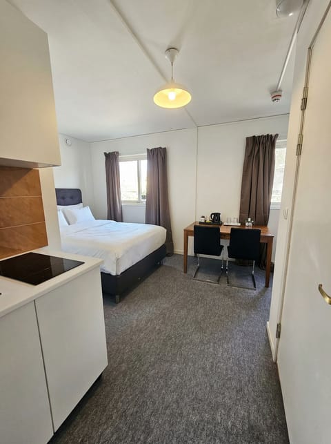 Laptop workspace, free WiFi, bed sheets