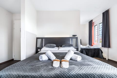 Family Triple Room, City View | Free WiFi, bed sheets