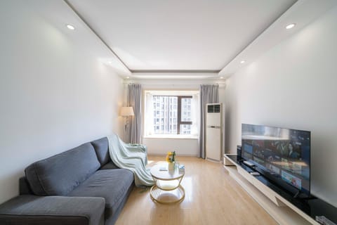 Superior Apartment, 2 Bedrooms, Kitchen, City View | Living room | 55-inch Smart TV with cable channels