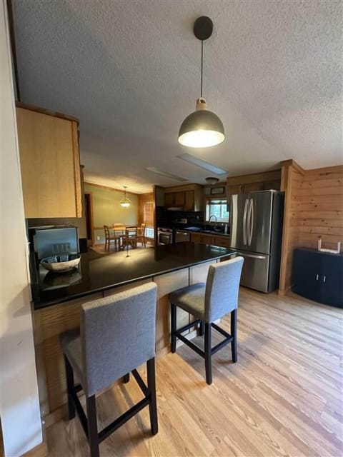 House, Patio, River View | Living area | Flat-screen TV