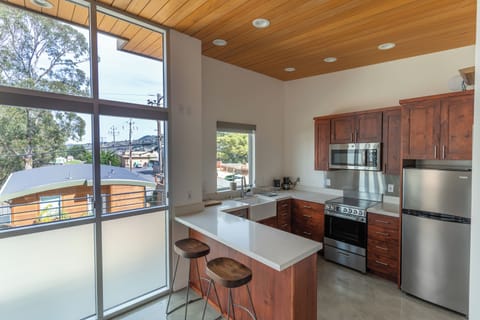 Family Suite, 1 Queen Bed with Sofa bed | Private kitchen | Full-size fridge, microwave, oven, stovetop