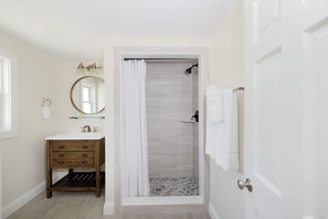 Shower, free toiletries, hair dryer, slippers