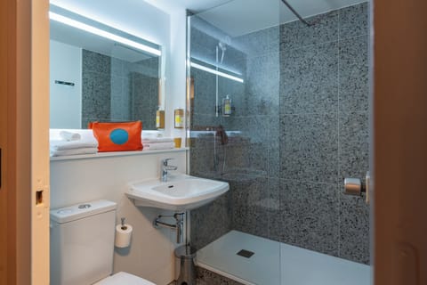 Combined shower/tub, hair dryer, towels, soap