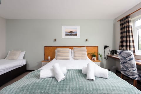 Family Quadruple Room, Private Bathroom, Ground Floor | Desk, laptop workspace, free WiFi