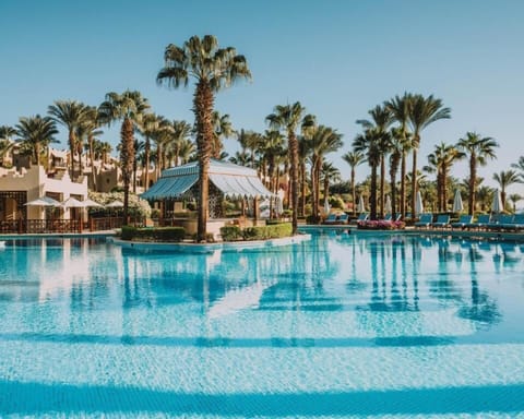 6 outdoor pools, open 7:00 AM to 6:00 PM, free cabanas, pool umbrellas
