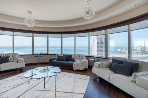 Deluxe Apartment, 4 Bedrooms, Non Smoking, Marina View | Living area | 55-inch Smart TV with cable channels, streaming services