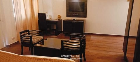 Deluxe Double or Twin Room, Balcony, Mountain View | Living area | Printers