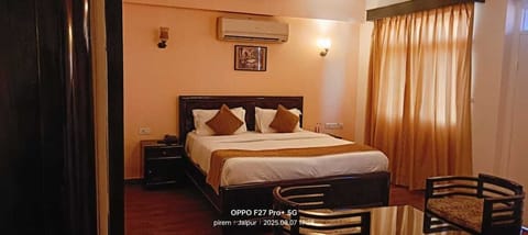 Desk, laptop workspace, blackout drapes, iron/ironing board