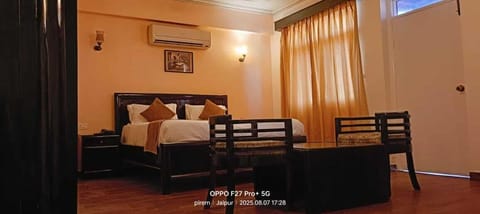 Deluxe Double or Twin Room, Balcony, Mountain View | Desk, laptop workspace, blackout drapes, iron/ironing board