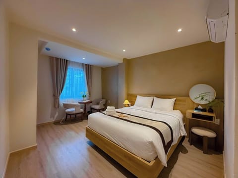Deluxe Room, City View | Premium bedding, in-room safe, blackout drapes, soundproofing