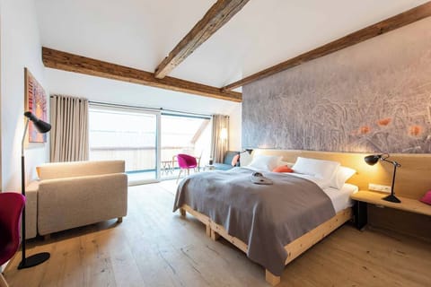 Junior Suite, Courtyard View | In-room safe, blackout drapes, free WiFi