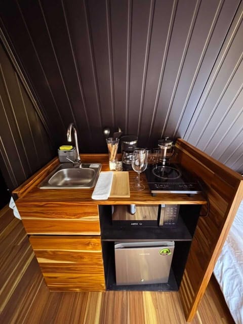 Classic Cabin, Patio, Garden View | Private kitchen | Mini-fridge, microwave, stovetop, coffee/tea maker