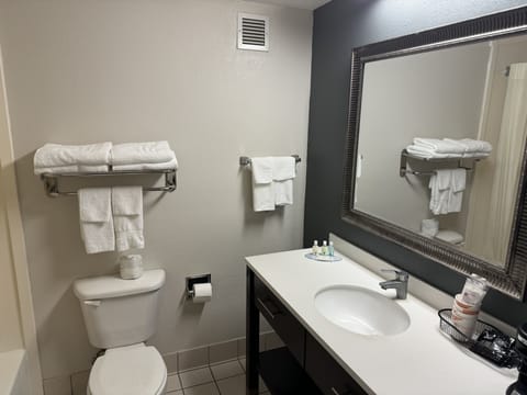 Room, 2 Queen Beds, Smoking | Bathroom | Combined shower/tub, free toiletries, towels