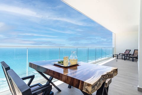 Condo, Multiple Beds, Balcony, Ocean View (Encantame Towers Velero 2204) | Outdoor dining