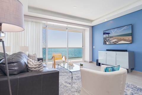Condo, Multiple Beds, Balcony, Ocean View (Encantame Towers Velero 1104) | Living area | 42-inch flat-screen TV with digital channels