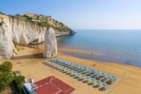 On the beach, sun loungers, beach umbrellas, beach bar