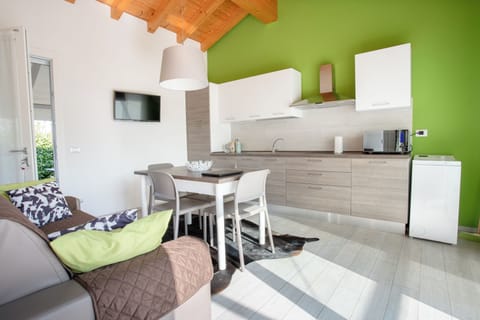 Studio, Private Bathroom, Pool View | Living area | 32-inch Smart TV with digital channels, heated floors