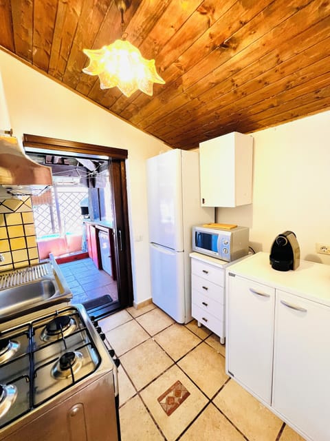 Apartment | Private kitchenette | Full-size fridge, microwave, stovetop, dishwasher