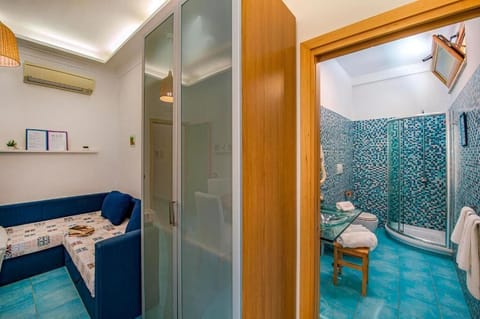 Junior Suite | Living area | 36-inch flat-screen TV with digital channels