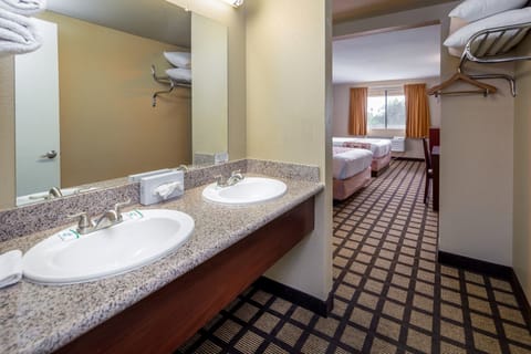 Double Queen Bed with Living Room Nonsmoking | Bathroom | Combined shower/tub, free toiletries, hair dryer, towels