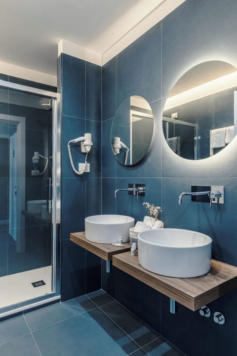 Shower, free toiletries, hair dryer, slippers