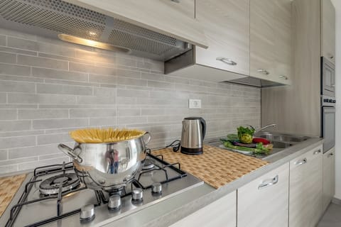 Family House, Multiple Bedrooms, Refrigerator & Microwave (Casa Nadia) | Private kitchen | Fridge, microwave, oven, stovetop