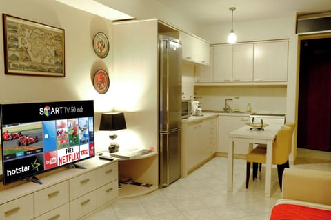 Apartment, City View | Living area | 50-inch Smart TV with cable channels, Netflix, streaming services