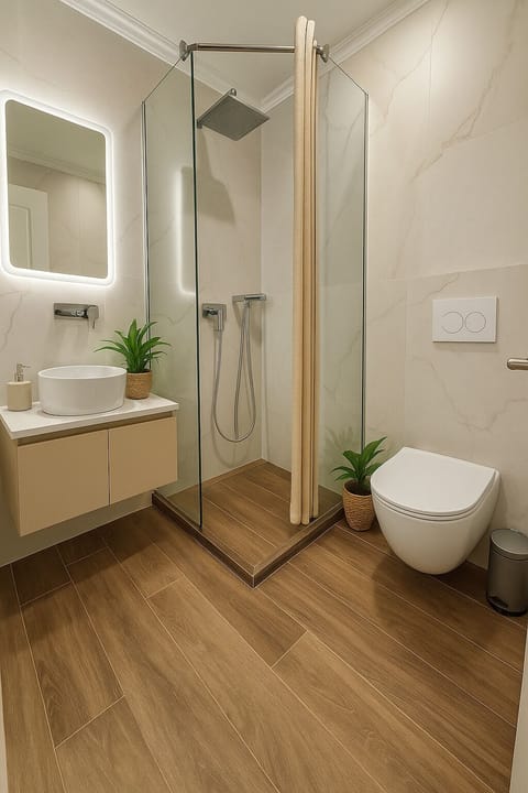 Shower, rainfall showerhead, hair dryer, towels