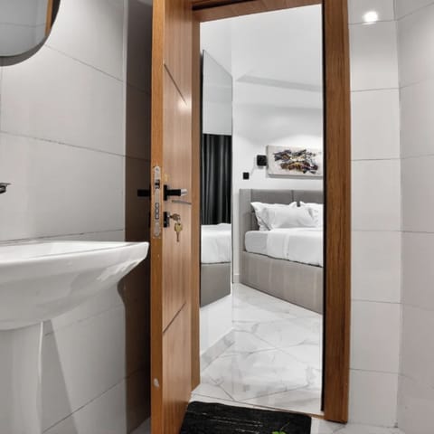 Shower, bathrobes, slippers, bidet