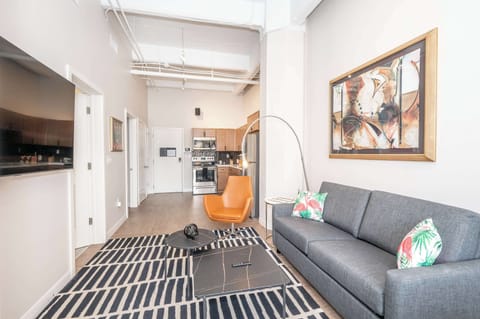 Apartment, Multiple Beds, Kitchen, City View (The 333 Suites 302) | Living area